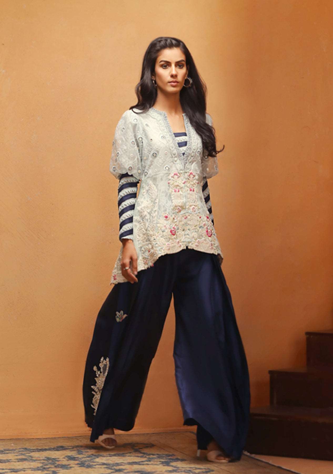 Ice blue coat with pleated pants