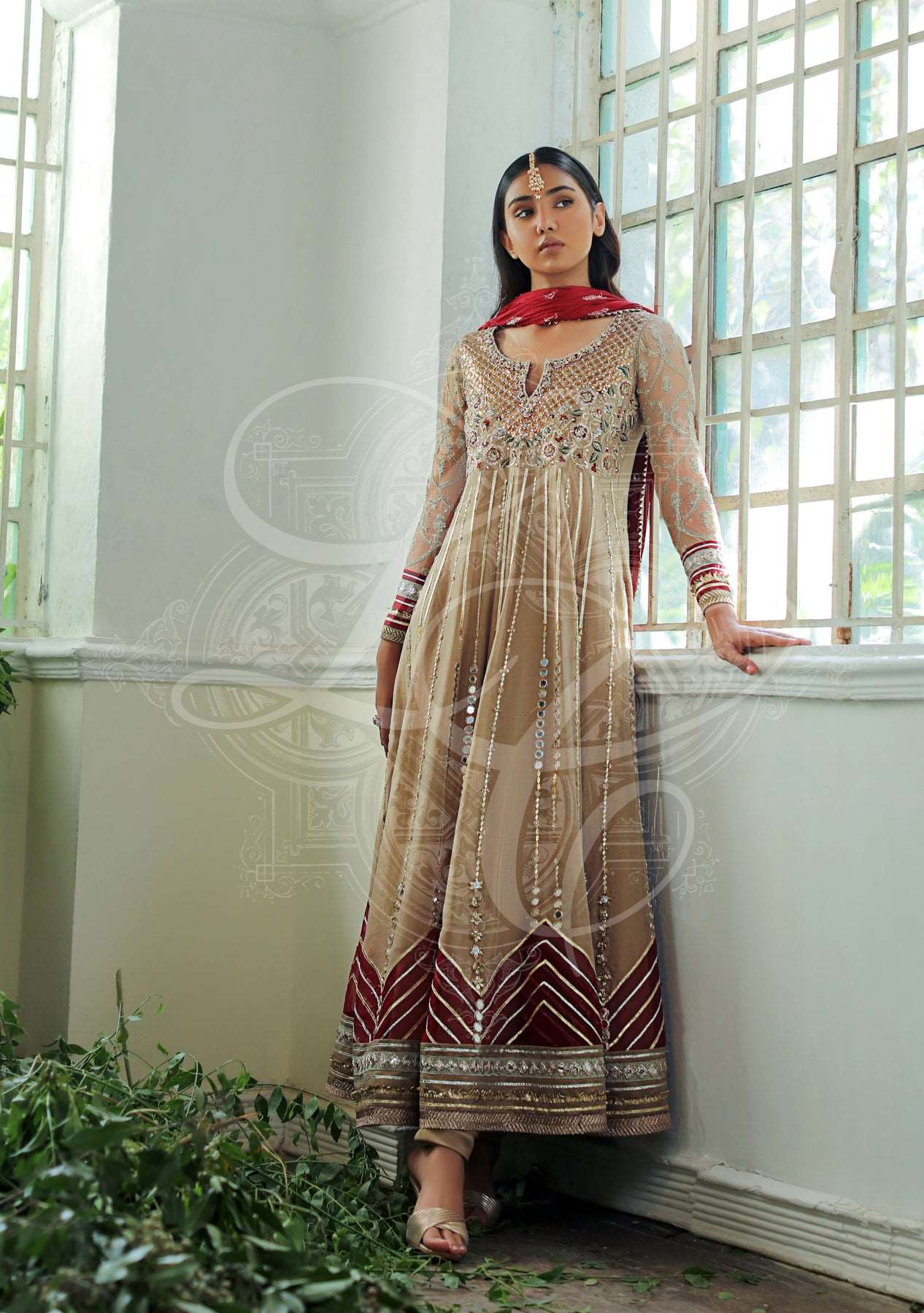 Beige peshwas with churidar and dupatta