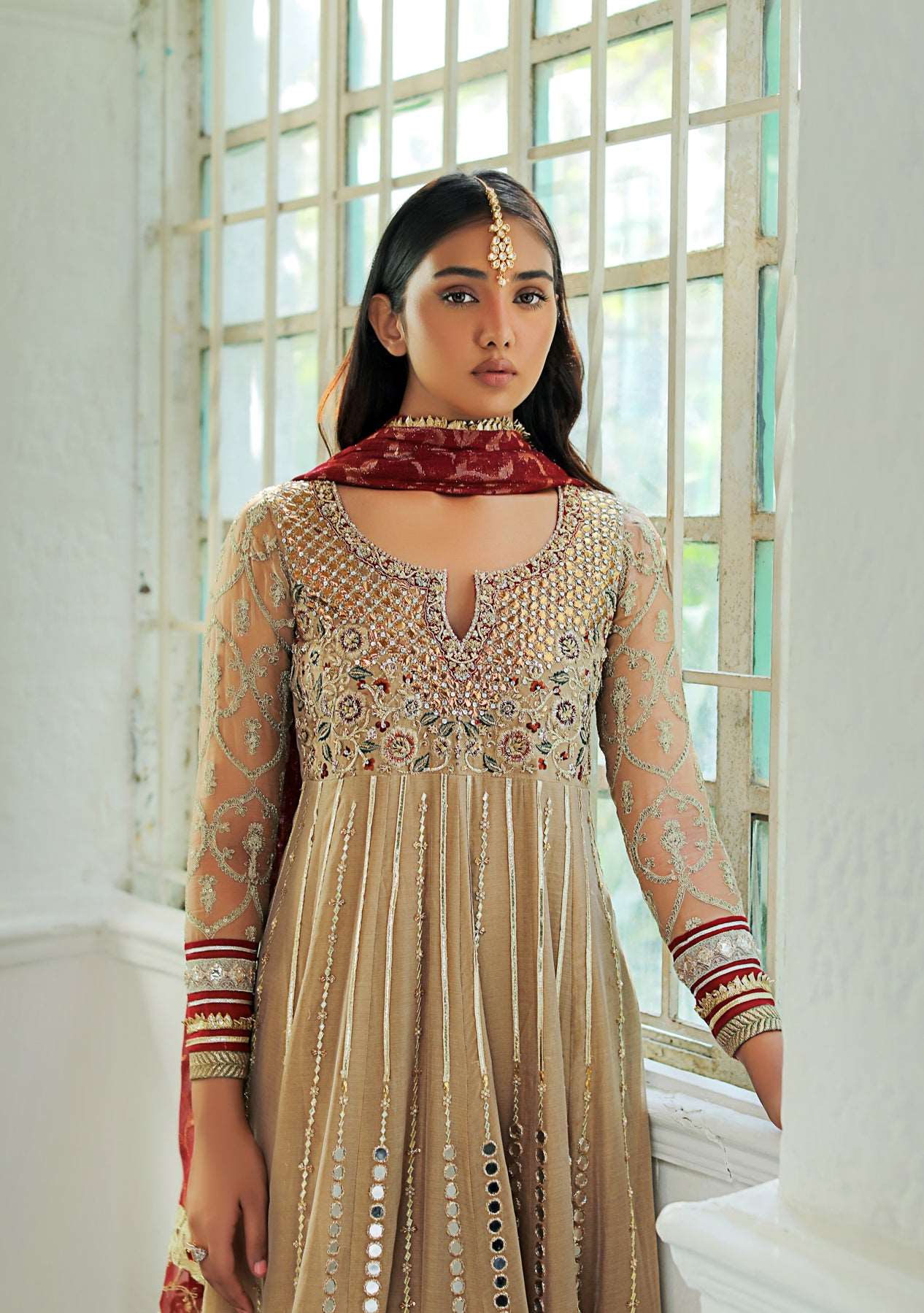 Beige peshwas with churidar and dupatta