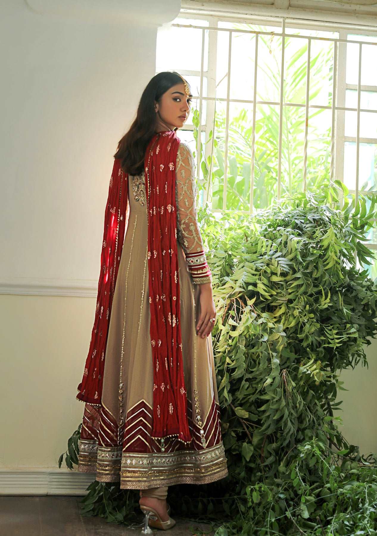 Beige peshwas with churidar and dupatta