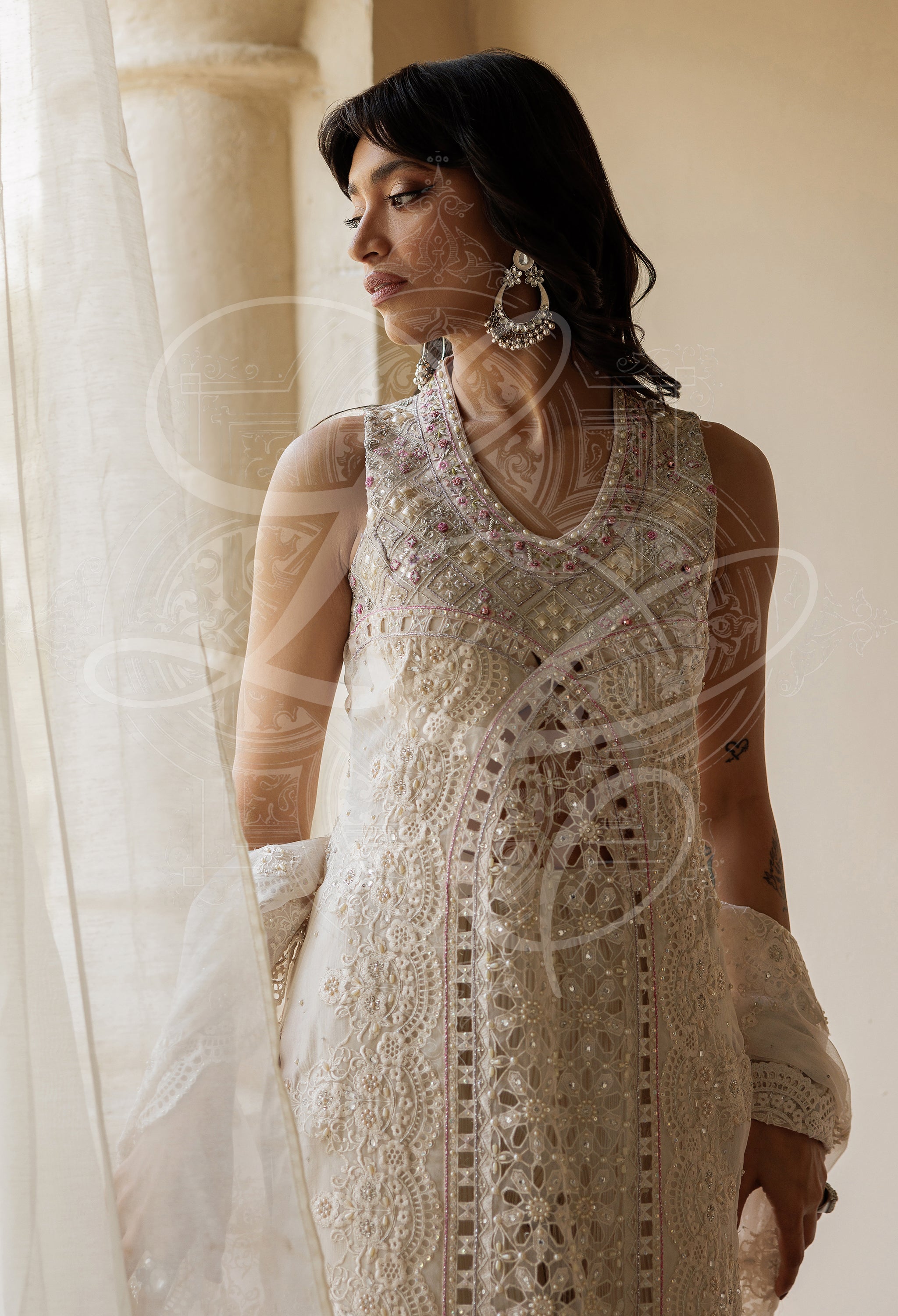Parvaneh - Long cutwork kameez with Striped gharara and organza ruffle