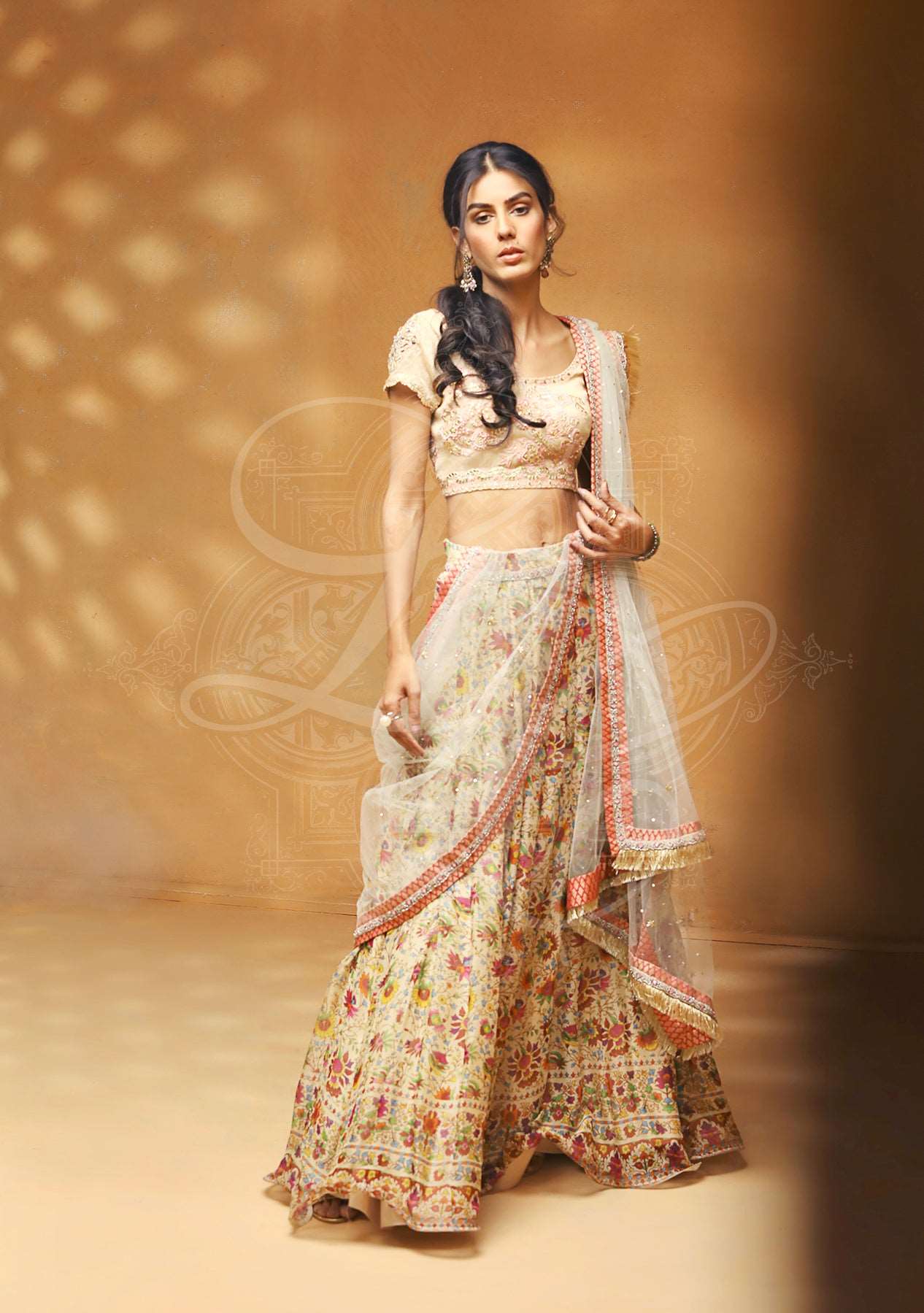 Blush pink lehenga choli with net dupatta