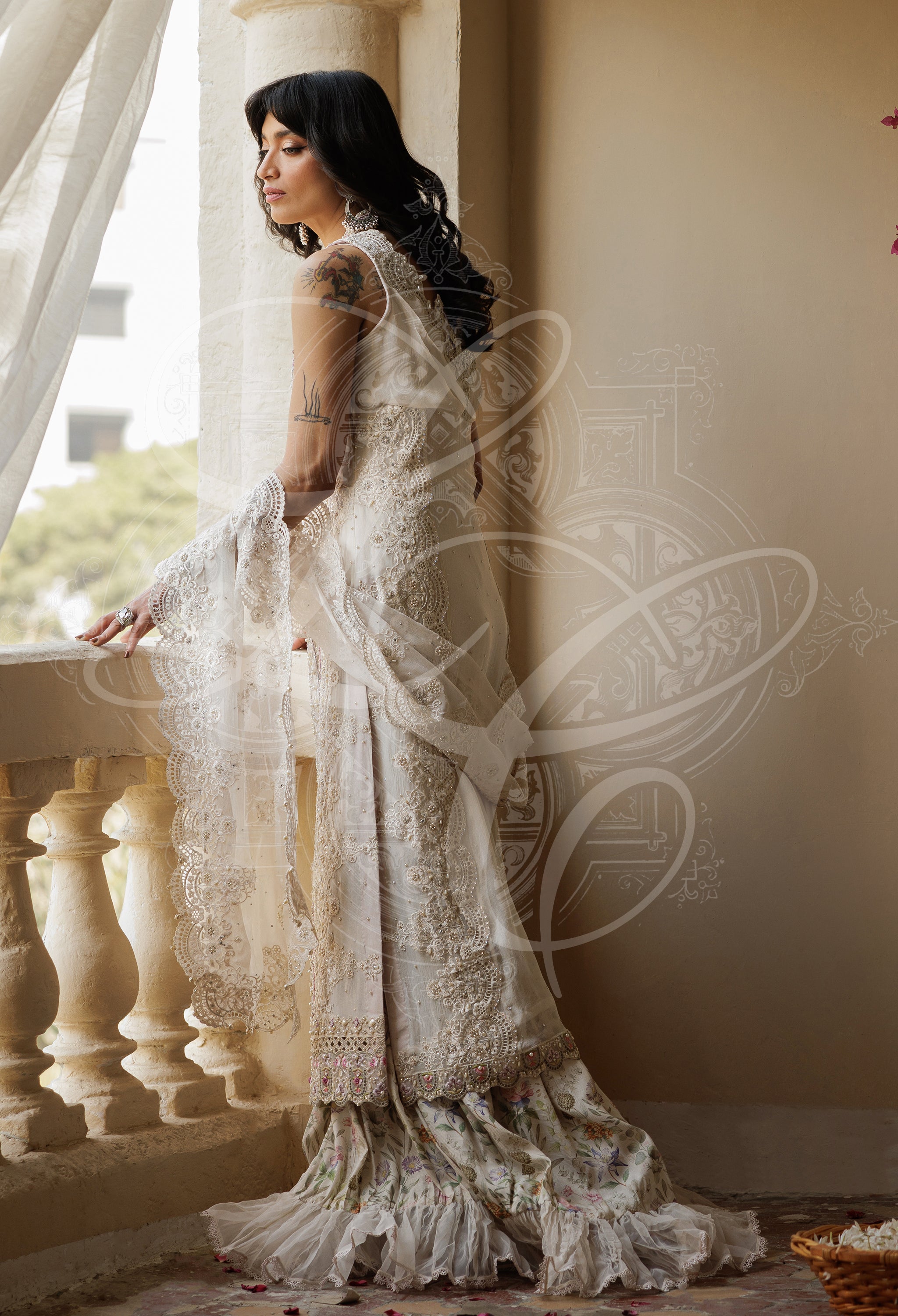 Parvaneh - Long cutwork kameez with Striped gharara and organza ruffle