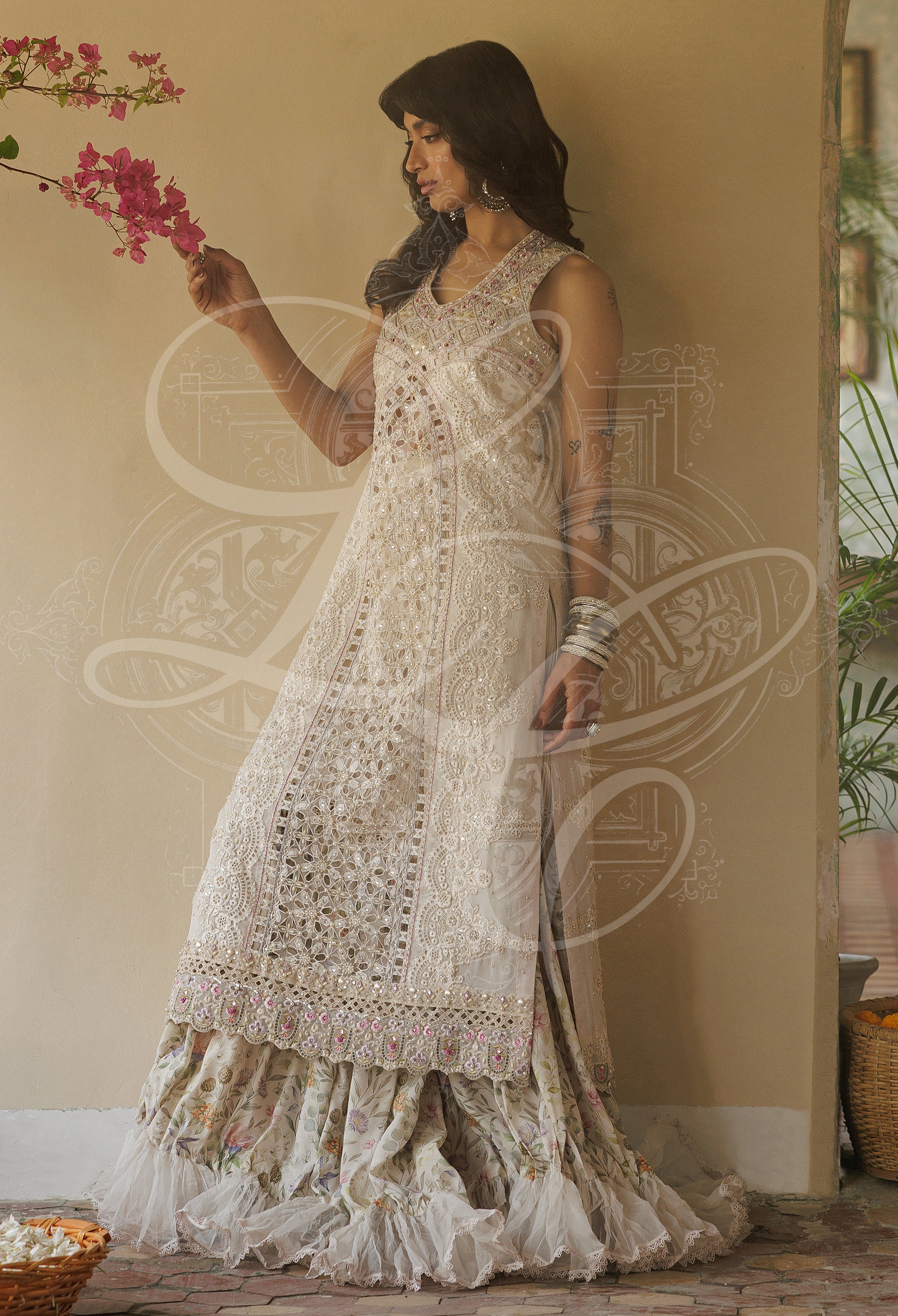 Parvaneh - Long cutwork kameez with Striped gharara and organza ruffle
