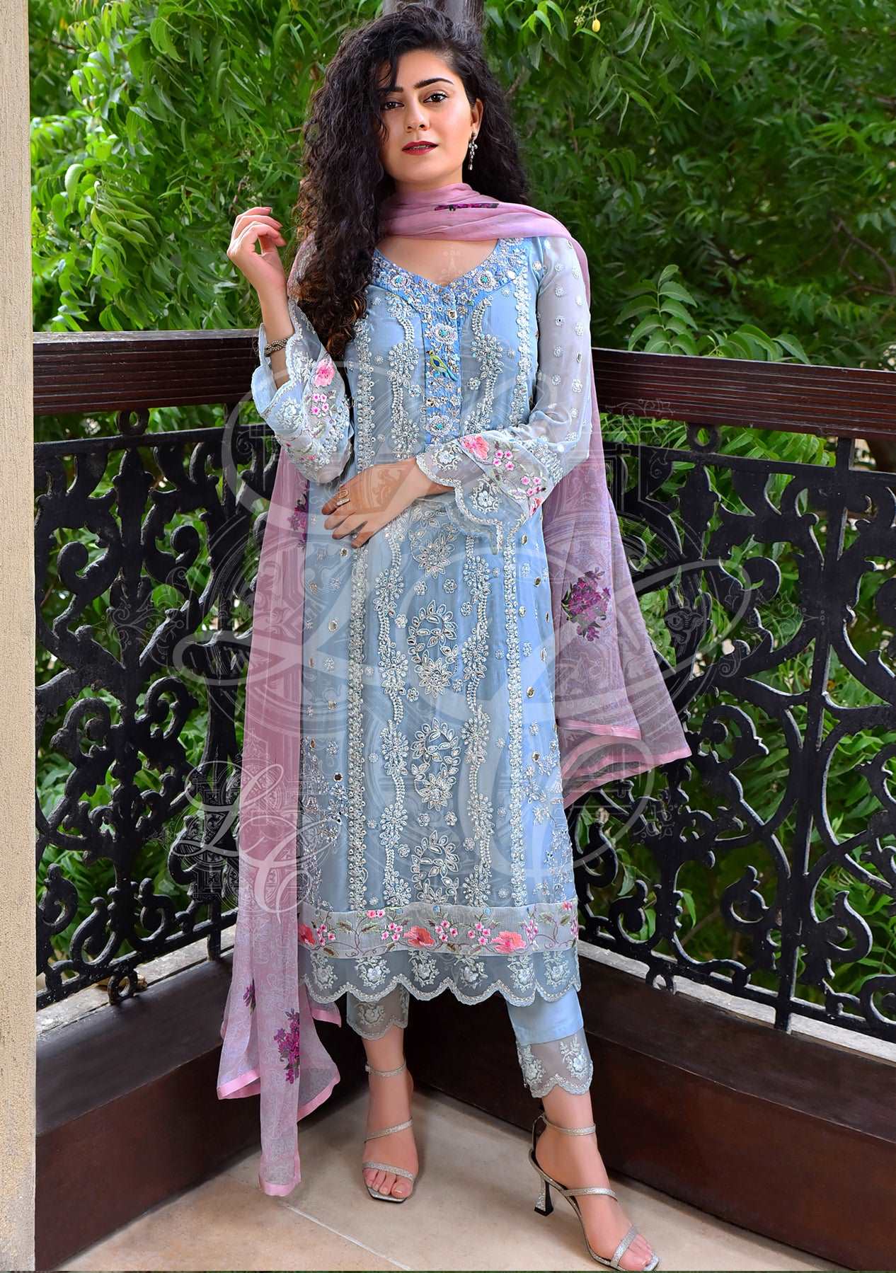 Blue gota work shirt paired with a shalwar and printed dupatta