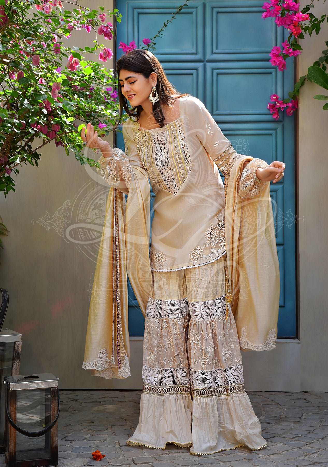 Beige tunic with crushed gharara and dupatta