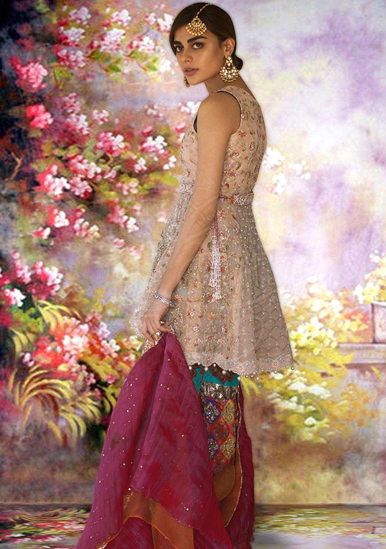 Peach peplum with printed gharara and dupatta