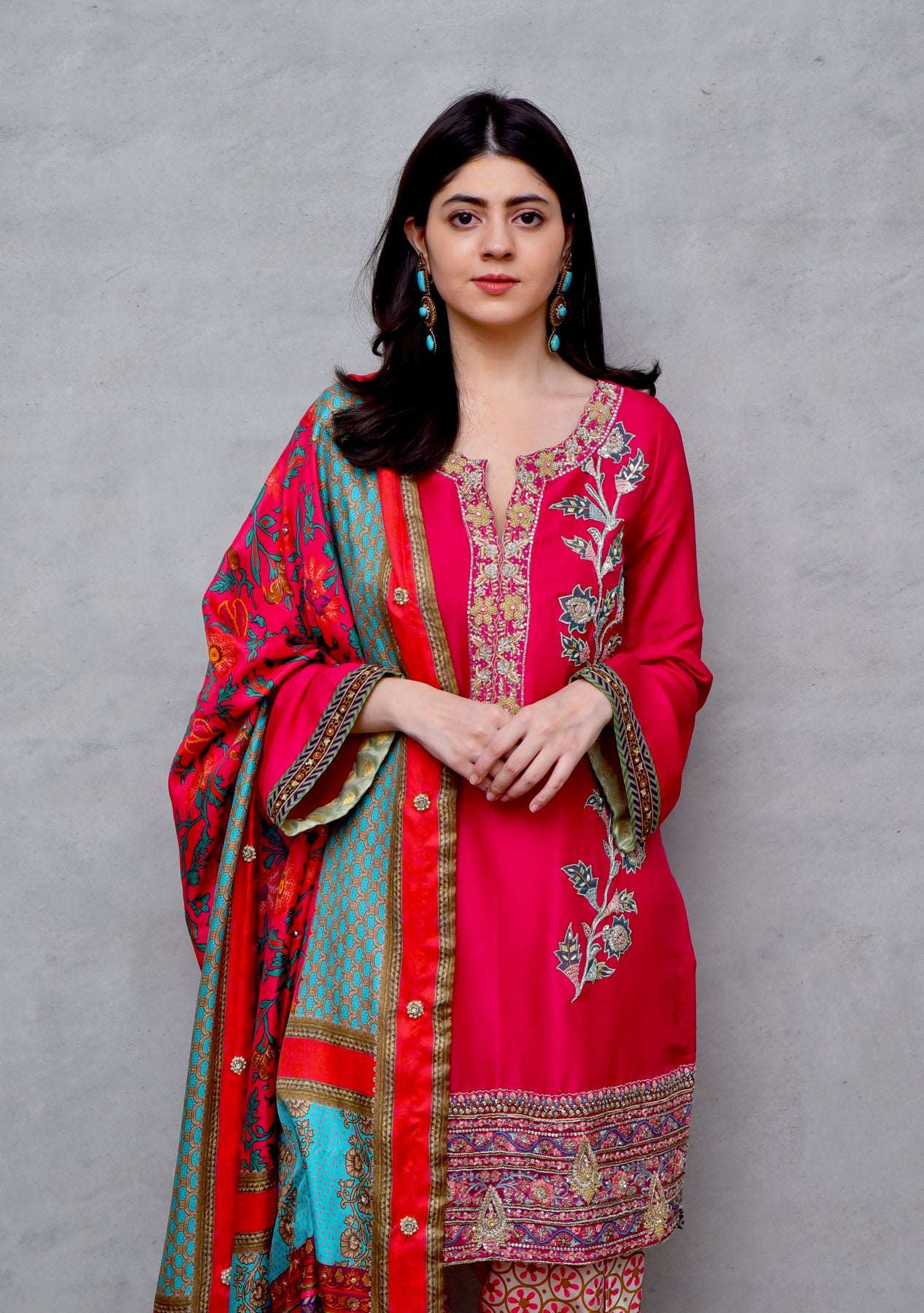 Fuchsia top with heavy border paired with tulip and dupatta