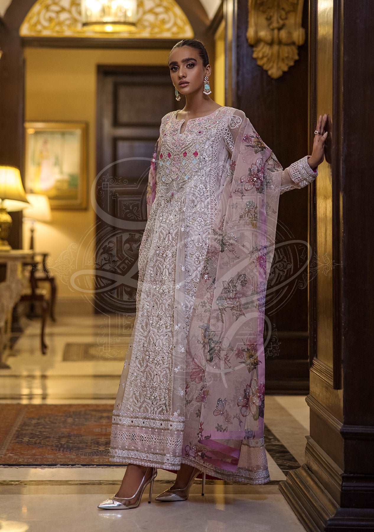 Pink chikankari peshwas with churidars and printed dupatta