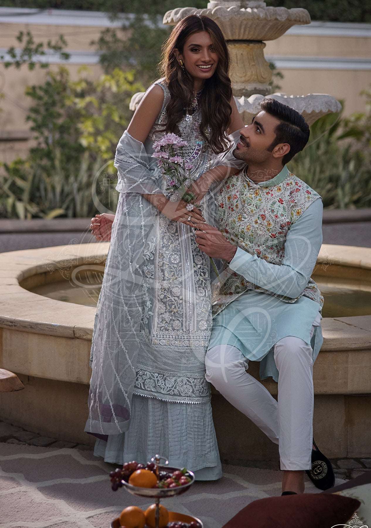 Blue chikankari long kameez with crushed gharara and organza dupatta