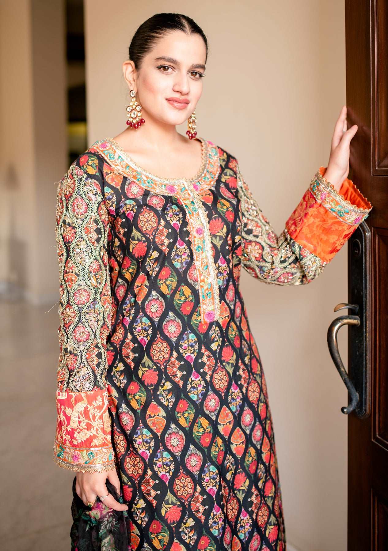 Black printed shirt paired with a shalwar and dupatta