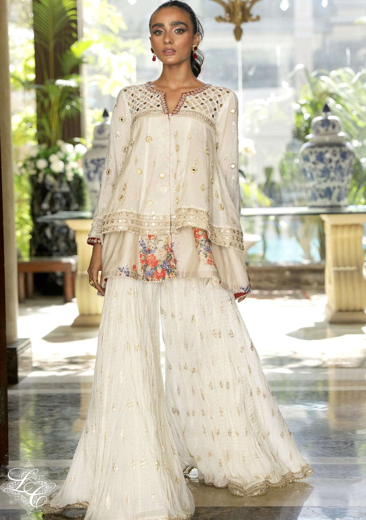 Layered peplum with crushed gharara