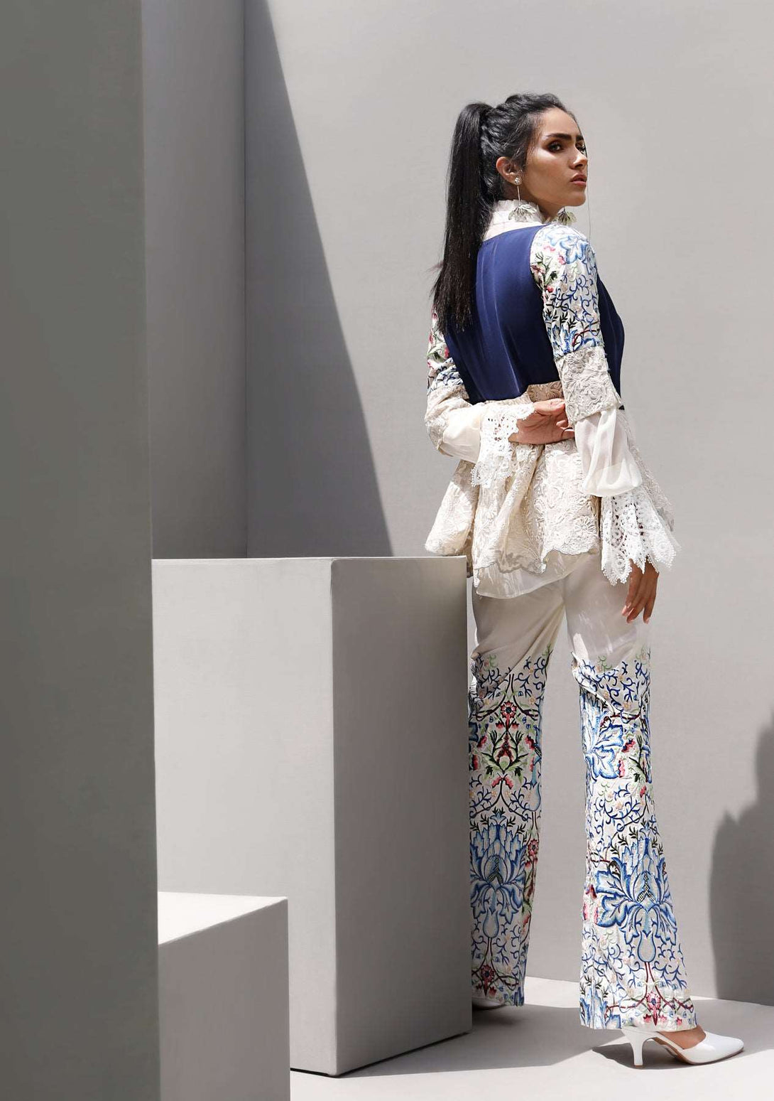 Navy peplum with embroidered pants