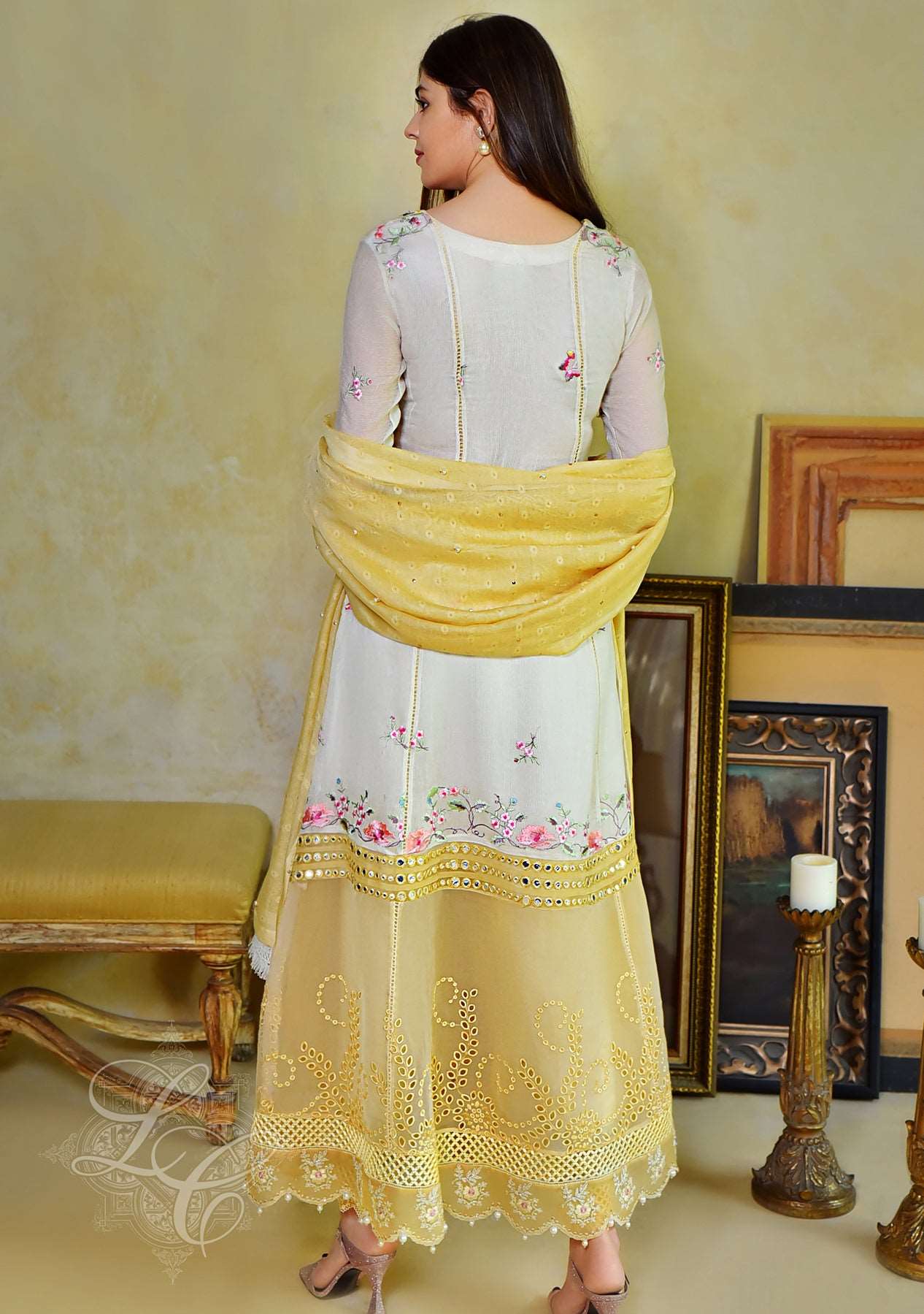 Off white and yellow peshwas with straight pants and dupatta