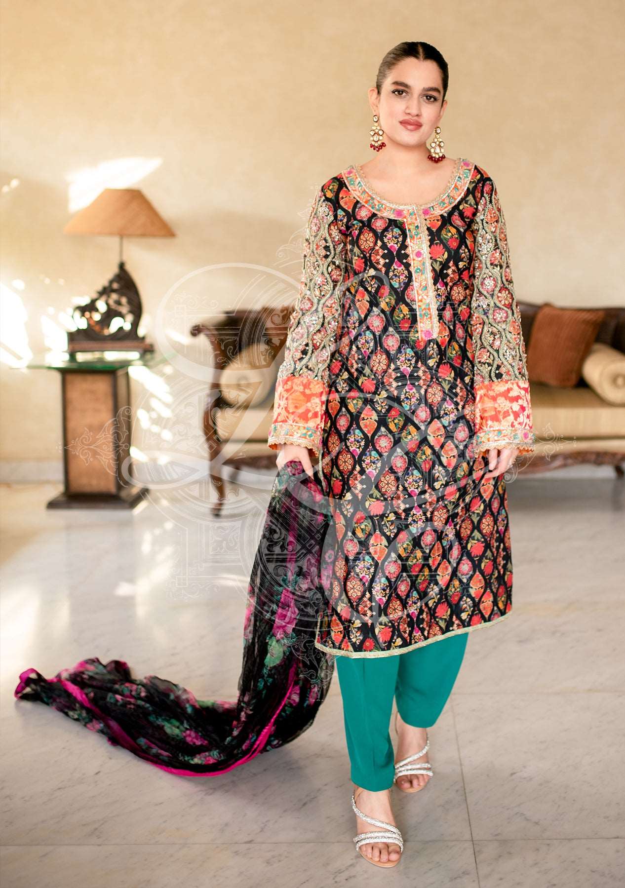 Black printed shirt paired with a shalwar and dupatta
