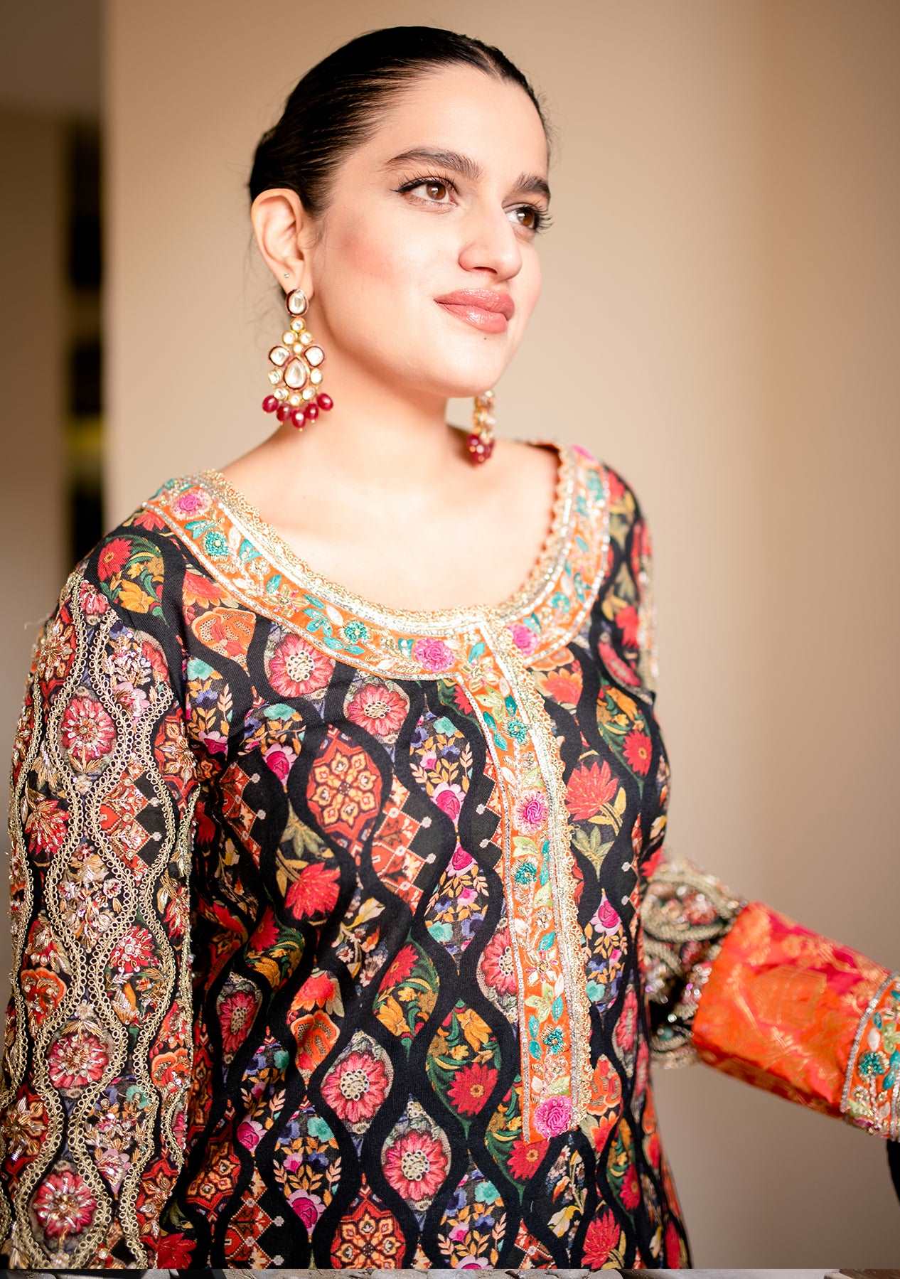 Black printed shirt paired with a shalwar and dupatta
