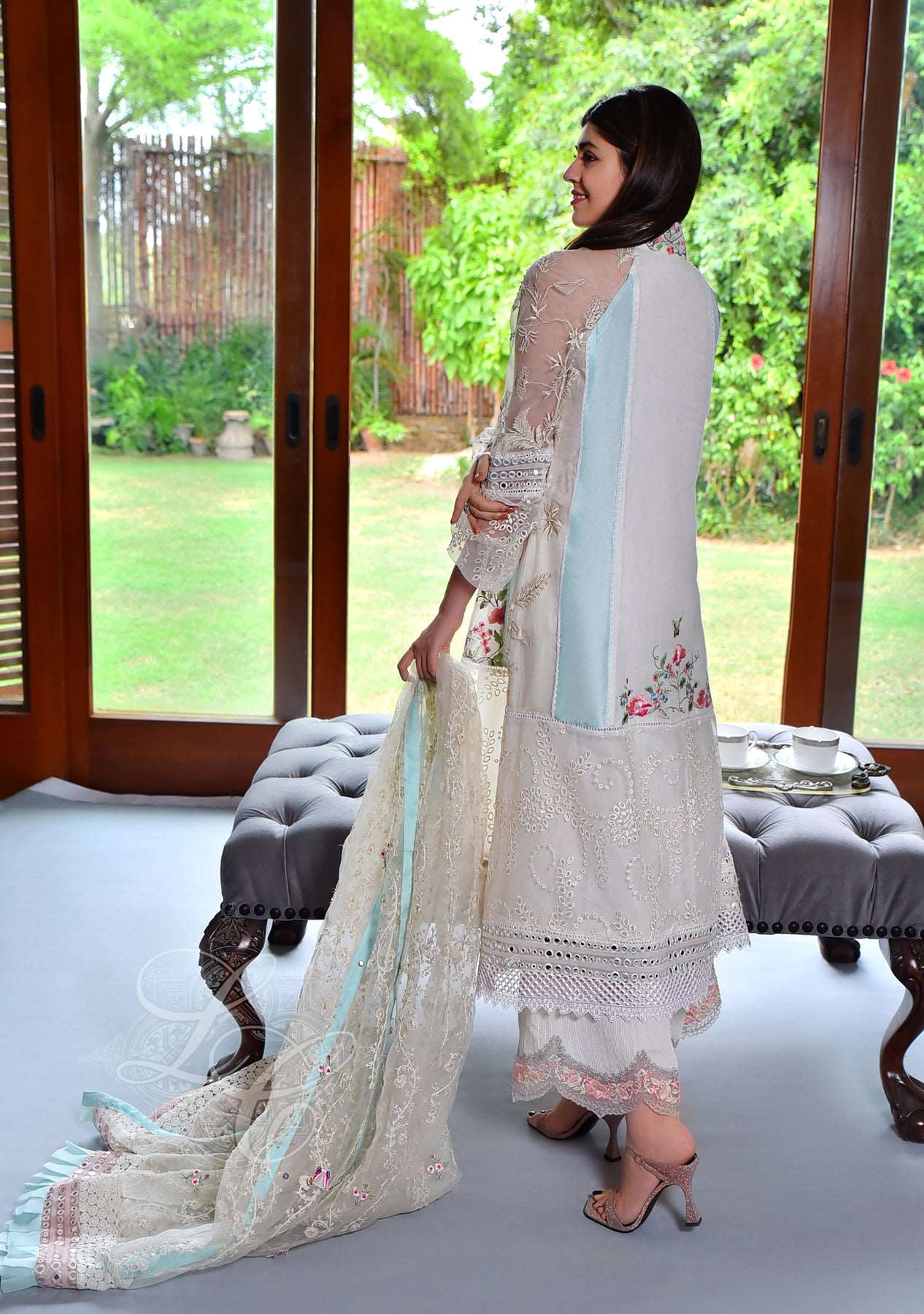Off white kalidar paired with culottes and organza dupatta